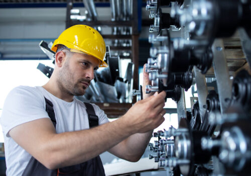 industrial-worker-working-production-line-factory